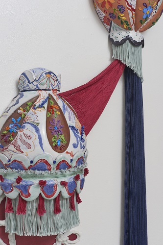 'La Reflejo (detail)' Ceramic, majolica glaze, and thread by Nicole McLaughlin